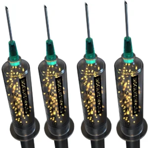 four spore syringes with yellow spores and green caps