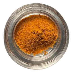jar of orange colored cordyceps crystals