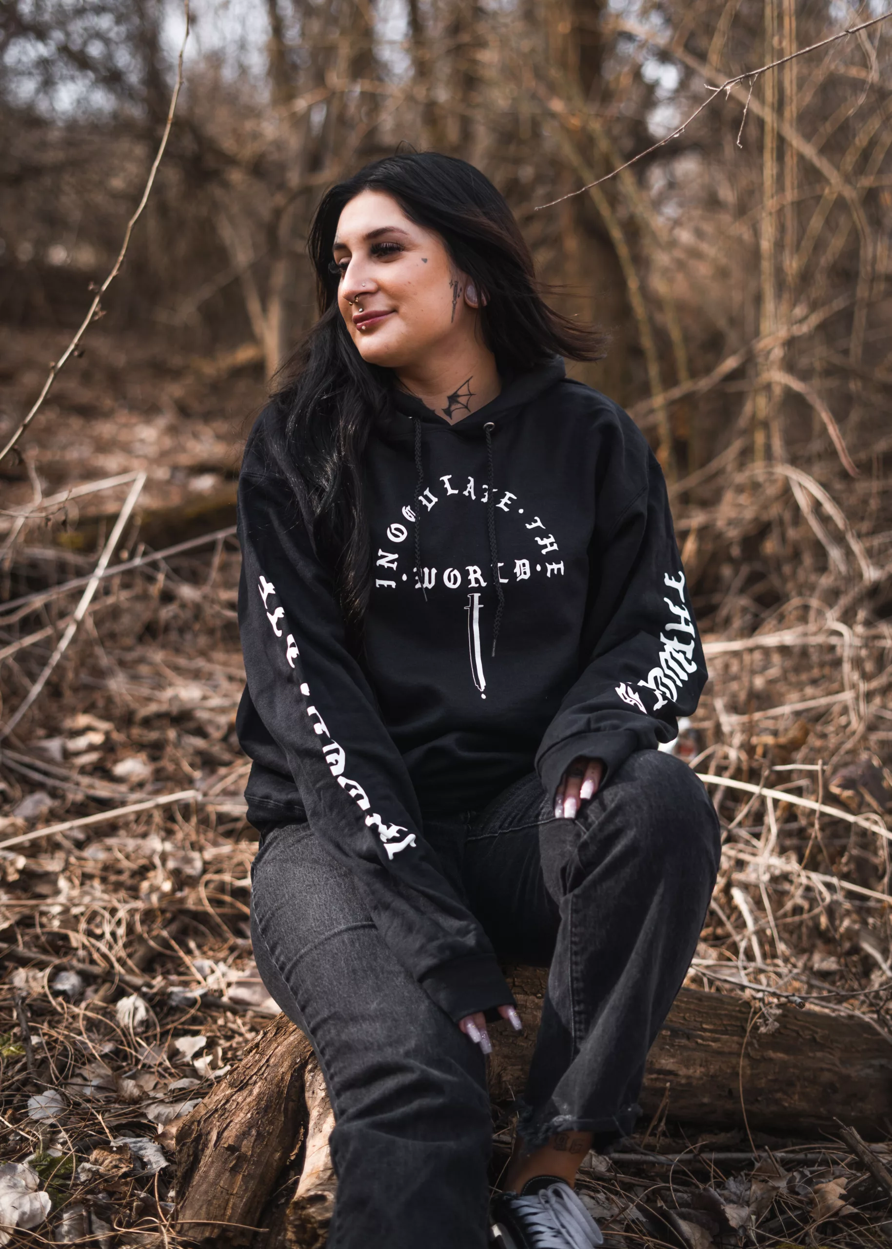 Woman wearing ITW spore syringe hoodie