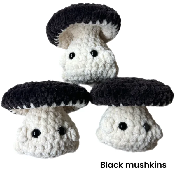 variety of assorted crochet mushrooms made with black polyester