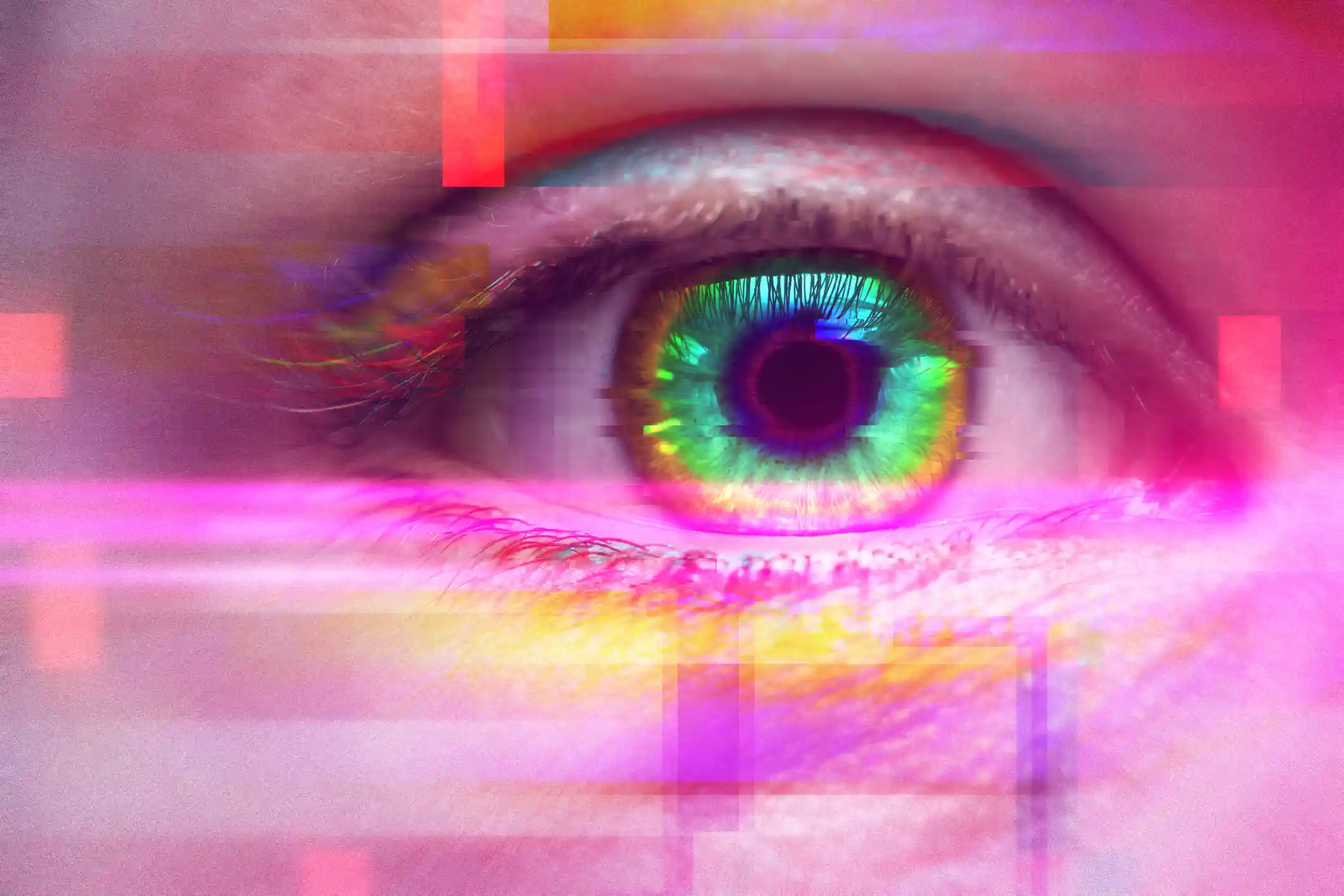 A close up of a human eye with psychedelic colors